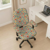 Cream desk chair cover with a vintage floral print featuring coral roses, mustard daisies, and green vines on a chair.