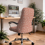 Pink chair cover with a botanical floral print shown on an office chair, with matching armrest covers and multiple cover style options.