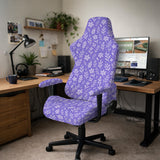 Purple desk chair cover with a botanical floral pattern shown in multiple slipcover options for full chair, back and seat, seat-only, and armrest-only coverage.