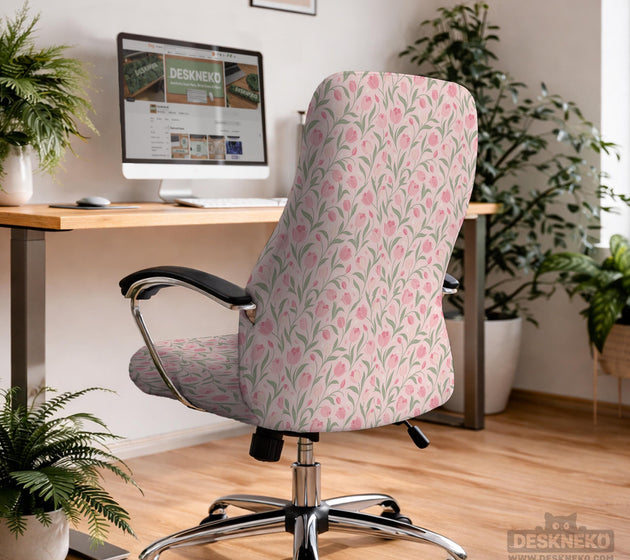 Pink chair cover with a tulip floral print shown as a desk chair slipcover, with armrest covers and size options.