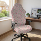 Pink floral stretch chair cover with a tulip pattern shown on a high-back gaming or office chair.