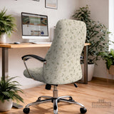 An ivory chair cover set with a subtle vine pattern shown on a black gaming chair, including cover options for the chair back, seat, and armrests.