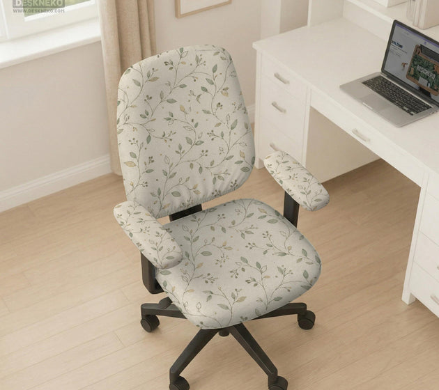 Cream floral chair covers with muted sage leaves and fine vine details on an ivory background, shown as multiple slipcover options for chair backs, seats, and armrests.