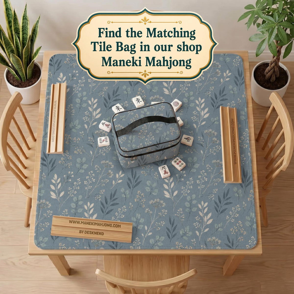 Blue mahjong mat with a dusty linen-look background and small leafy botanical stems in a floral pattern.