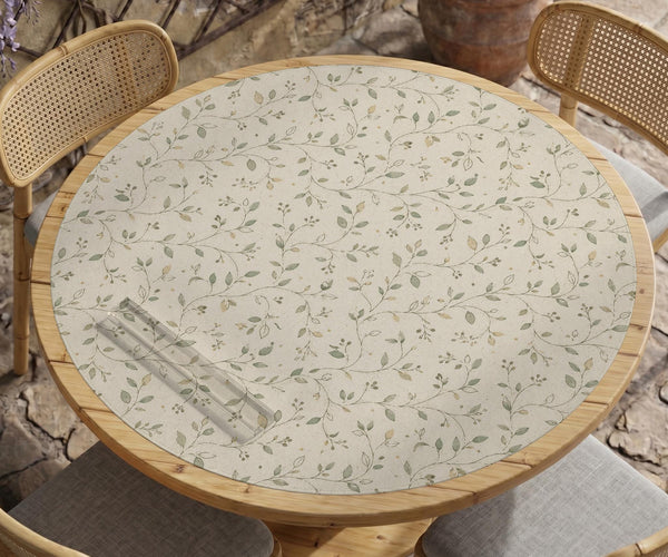 Sage green botanical mahjong mat with a cream background, trailing vines, and muted leaf designs.