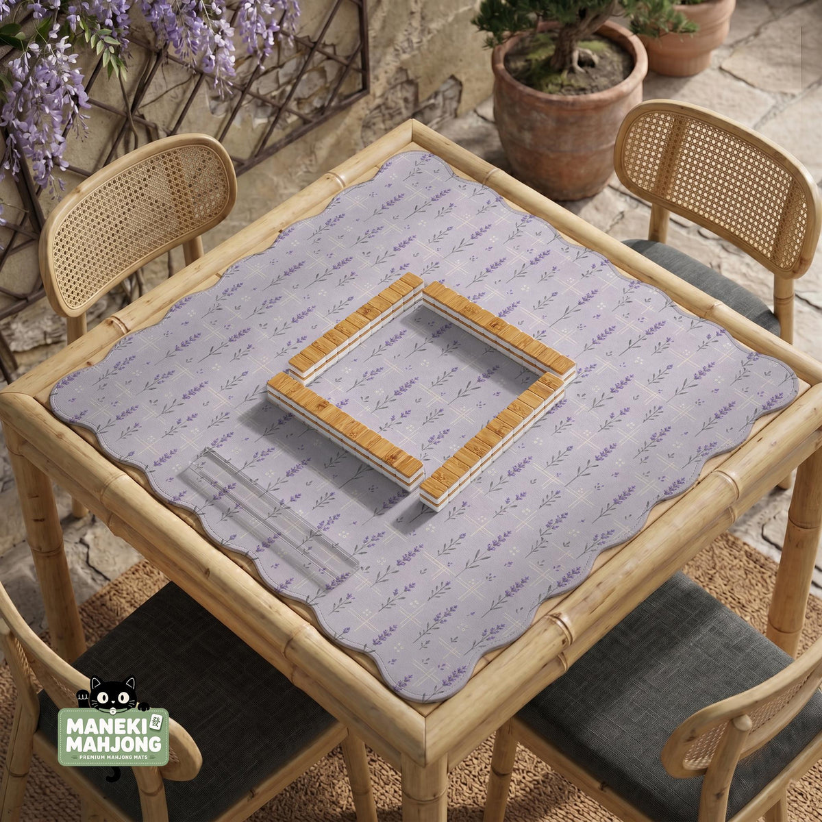 Lavender mahjong mat with a pale purple background, small botanical sprigs, and fine grid lines.