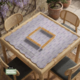Lavender mahjong mat with a pale purple background, small botanical sprigs, and fine grid lines.