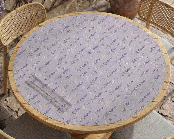 Lavender mahjong mat with a pale purple background, small botanical sprigs, and fine grid lines.