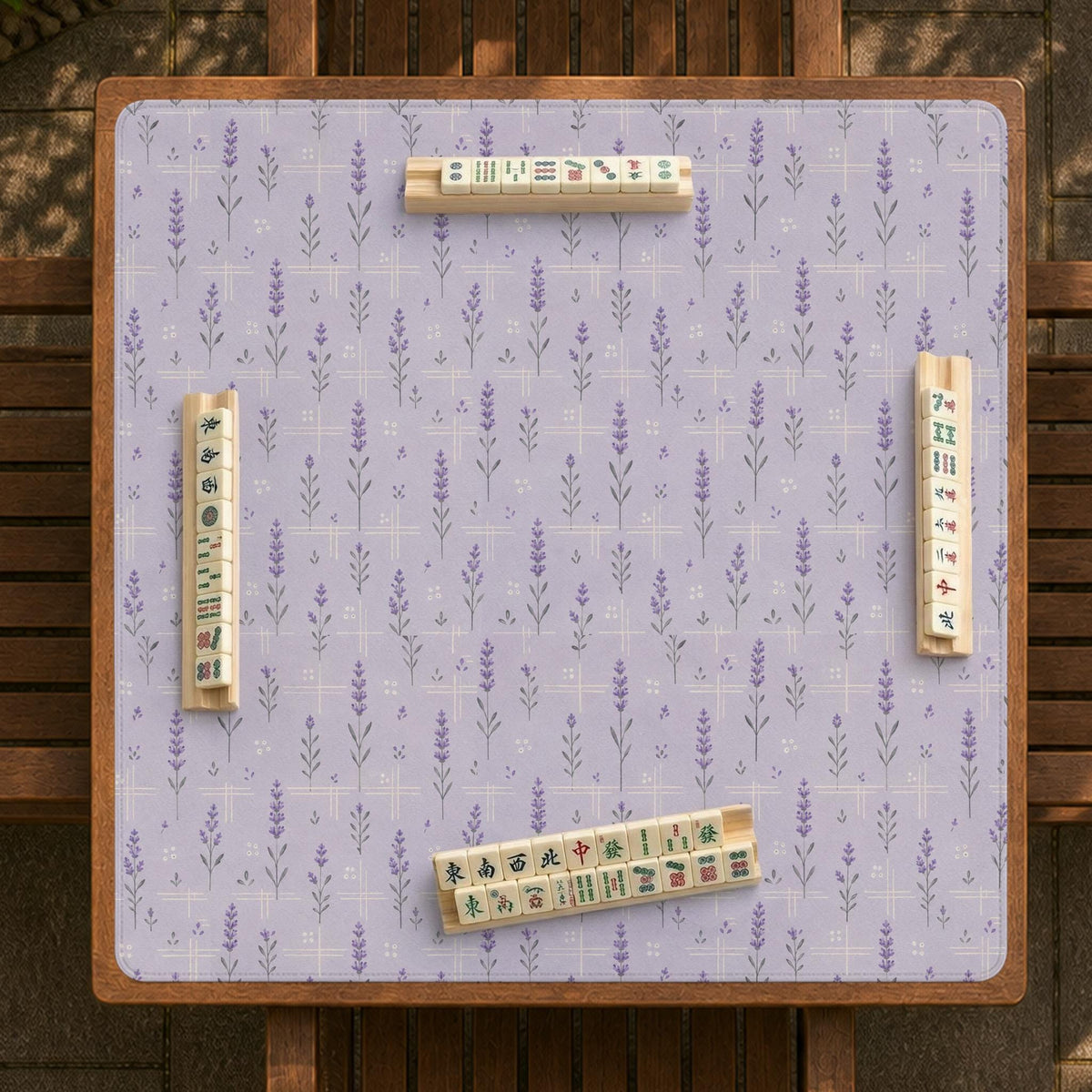 Lavender mahjong mat with a pale purple background, small botanical sprigs, and fine grid lines.