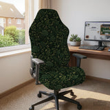 Forest green chair cover with a tropical leaf pattern featuring monstera leaves and small cream flowers.