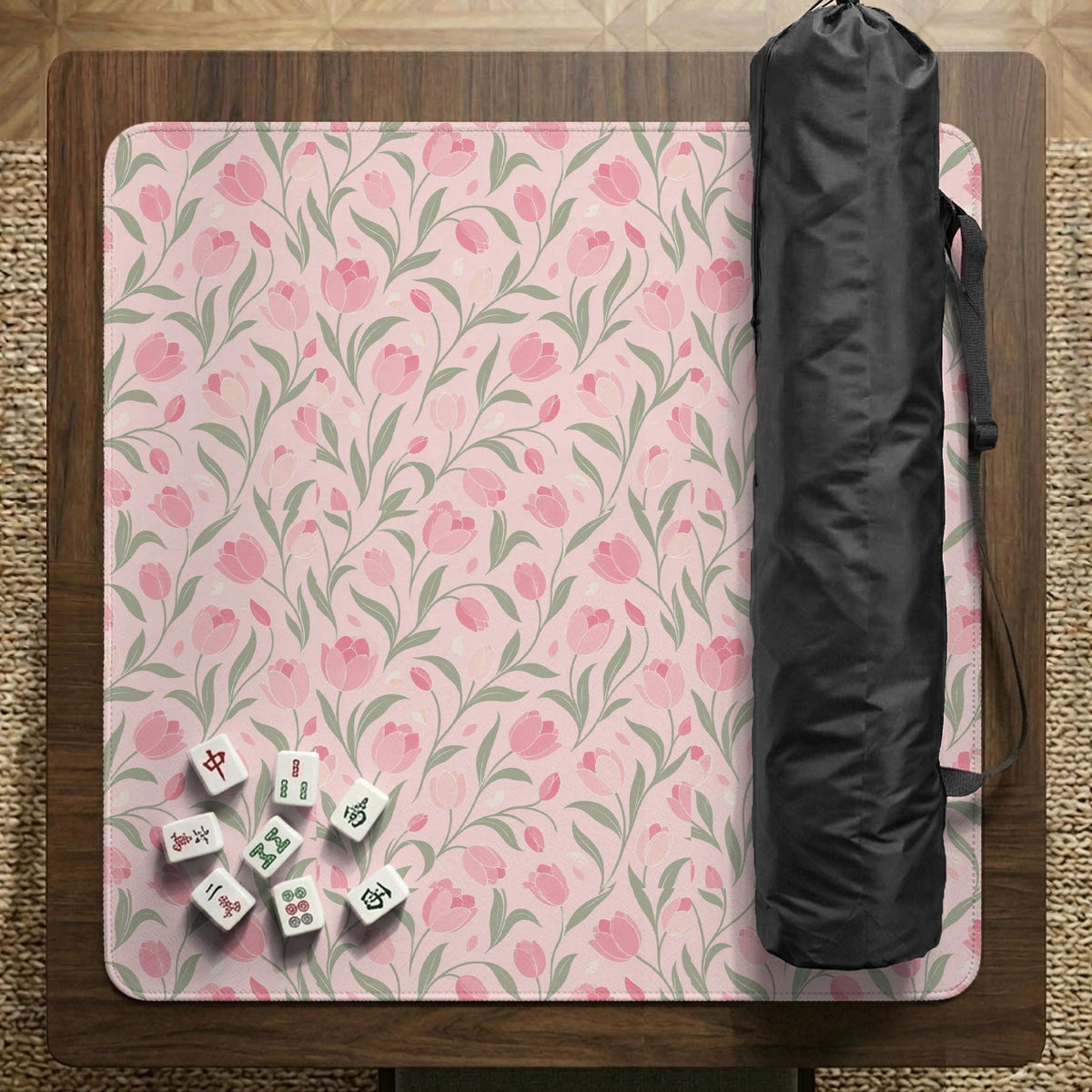Pink mahjong mat with a tulip floral pattern in blush and sage tones and a scalloped edge.