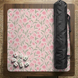 Pink mahjong mat with a botanical tulip floral pattern in blush tones, shown in a tablecloth-style square layout.