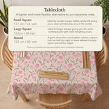 Pink mahjong mat with a botanical tulip floral pattern in blush tones, shown in a tablecloth-style square layout.