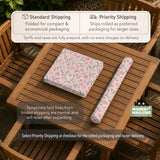 Pink mahjong mat with a tulip floral pattern in blush and sage tones and a scalloped edge.