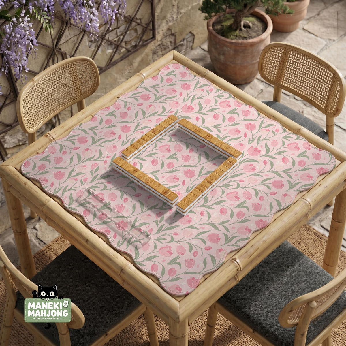 Pink mahjong mat with a botanical tulip floral pattern in blush tones, shown in a tablecloth-style square layout.