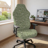 Sage green chair cover with a small floral print shown on a desk chair with a high back.