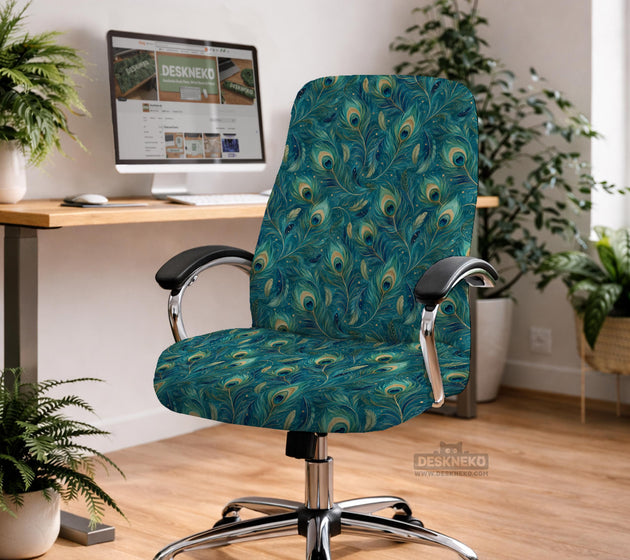 A blue green chair cover with a peacock feather design shown on an office chair with armrests.