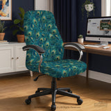 A blue green chair cover with a peacock feather design shown on an office chair with armrests.
