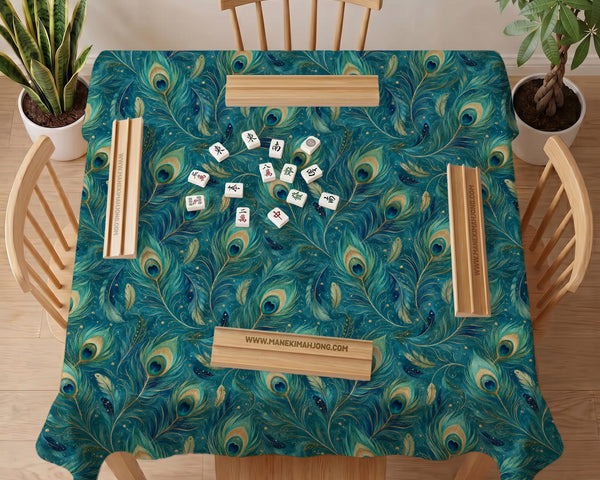 Teal mahjong mat with a peacock feather pattern in blue green tones.