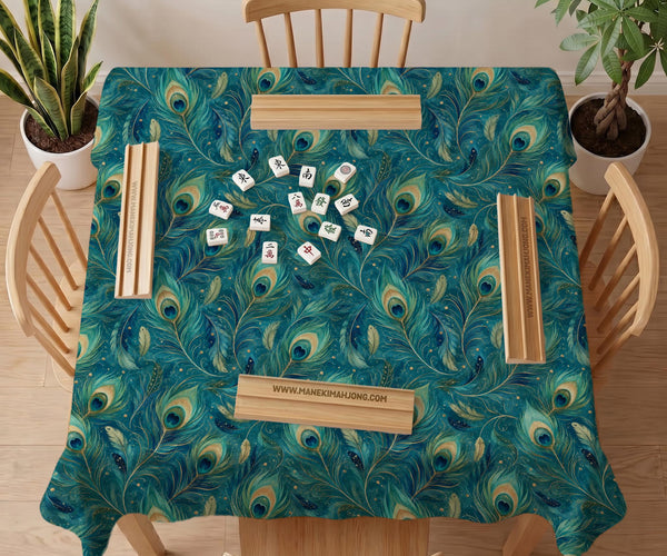 Teal mahjong mat with a peacock feather pattern in blue green tones.