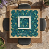 Teal mahjong mat with a peacock feather pattern in blue green tones.