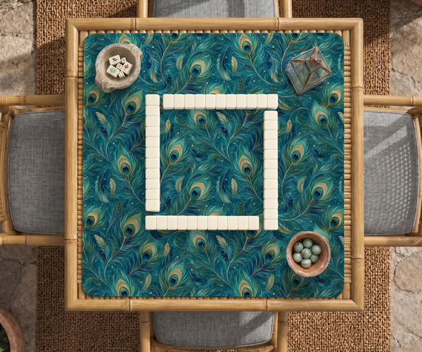 Teal mahjong mat with a peacock feather pattern in blue green tones.