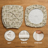 Sage and cream leaf print chair covers shown as full chair cover, back and seat cover, seat cover, and armrest covers for a high back desk chair.