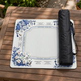 Blue and white square mahjong mat with lucky cat artwork, floral chinoiserie pattern, tile icons, and a rule guide layout.