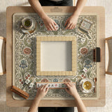 Square mahjong table mat with vintage bird artwork, floral border detail, and sage green, cream, muted blue, and terracotta tones.