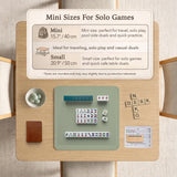 A plain light sage green square mahjong mat with a smooth solid-color surface.