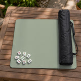 A plain light sage green square mahjong mat with a smooth solid-color surface.