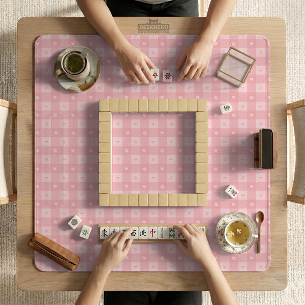 Pink checkered mahjong mat with small hearts and flowers.