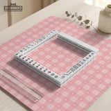 Pink checkered mahjong mat with small hearts and flowers.