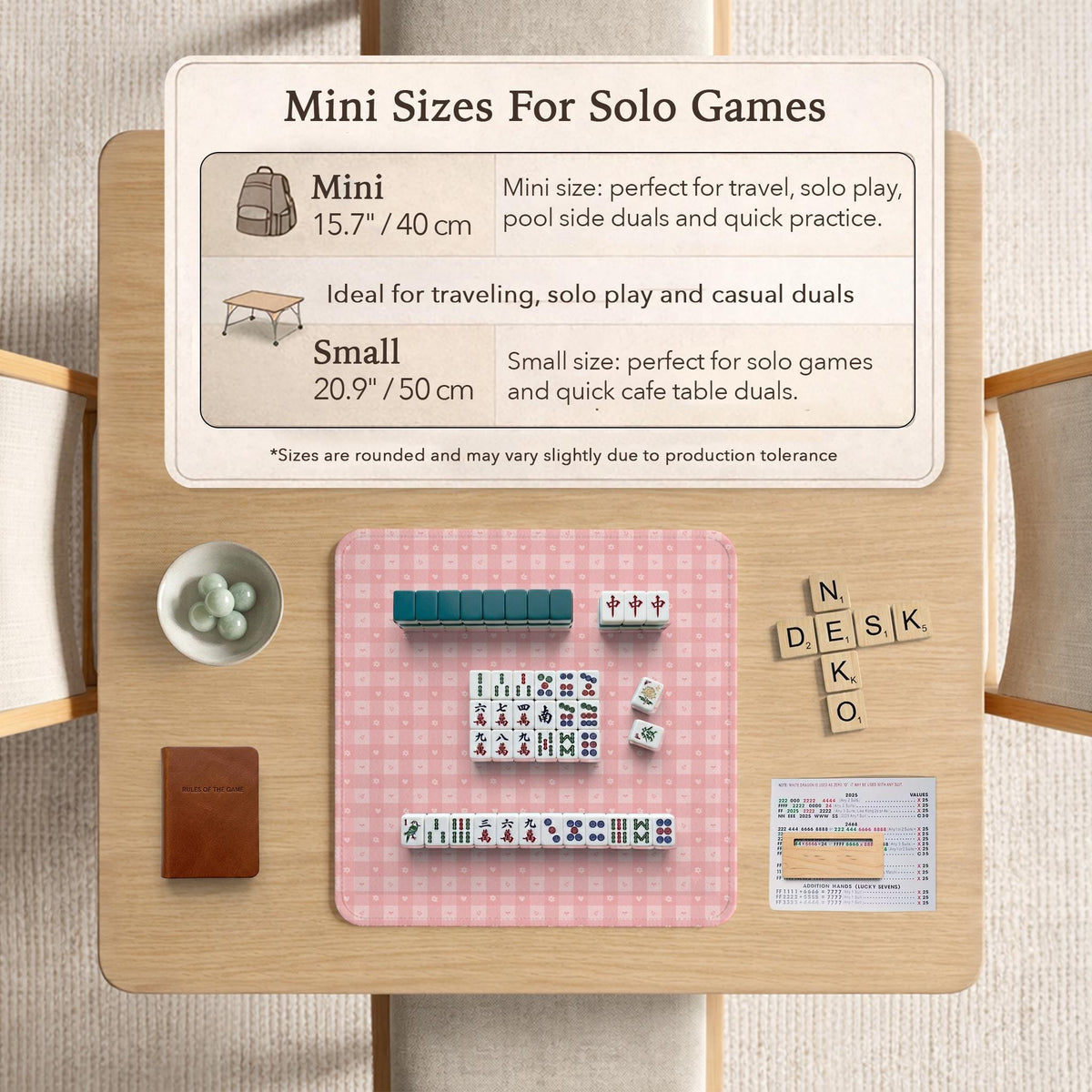 Pink checkered mahjong mat with small hearts and flowers.