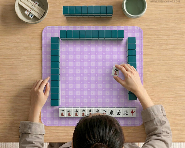 Lavender gingham mahjong mat with a scalloped edge and a pastel check pattern.