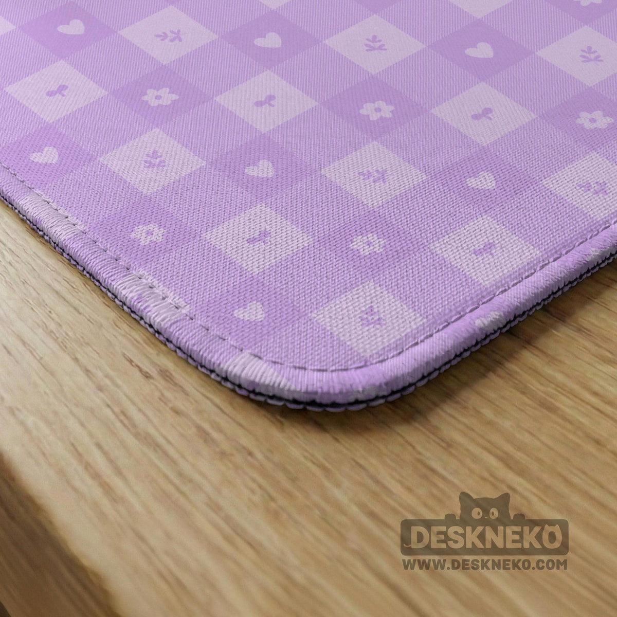 Lavender gingham mahjong mat with a scalloped edge and a pastel check pattern.