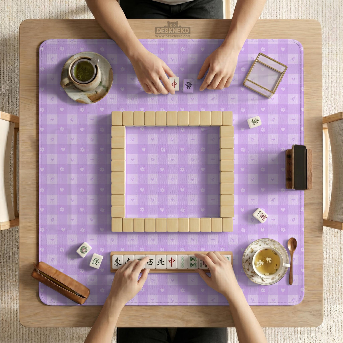 Lavender gingham mahjong mat with a scalloped edge and a pastel check pattern.