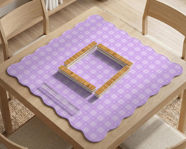 Lavender gingham mahjong mat with a scalloped edge and a pastel check pattern.