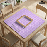 Lavender gingham mahjong mat with a scalloped edge and a pastel check pattern.