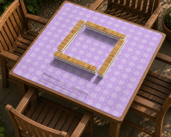 Lavender gingham mahjong mat with a scalloped edge and a pastel check pattern.