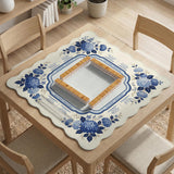 Blue and white mahjong table mat with a floral border, small birds, pagoda details, striped center, and printed rules around the edge.