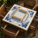 Blue and white mahjong table mat with a floral border, small birds, pagoda details, striped center, and printed rules around the edge.