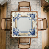 Blue and white mahjong table mat with a floral border, small birds, pagoda details, striped center, and printed rules around the edge.