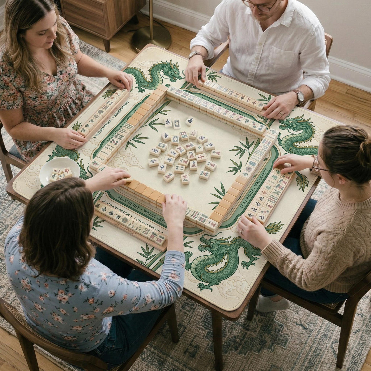 Sage green mahjong mat with a bamboo pattern, dragon design, printed rules around the edge, and a scalloped edge option.