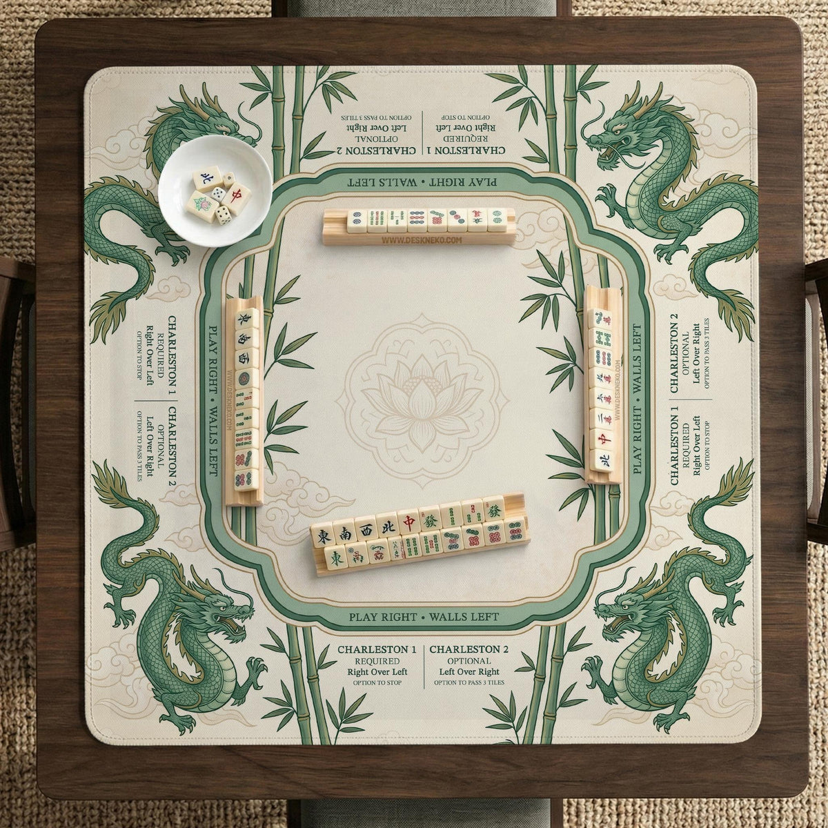 Sage green mahjong mat with a bamboo pattern, dragon design, printed rules around the edge, and a scalloped edge option.