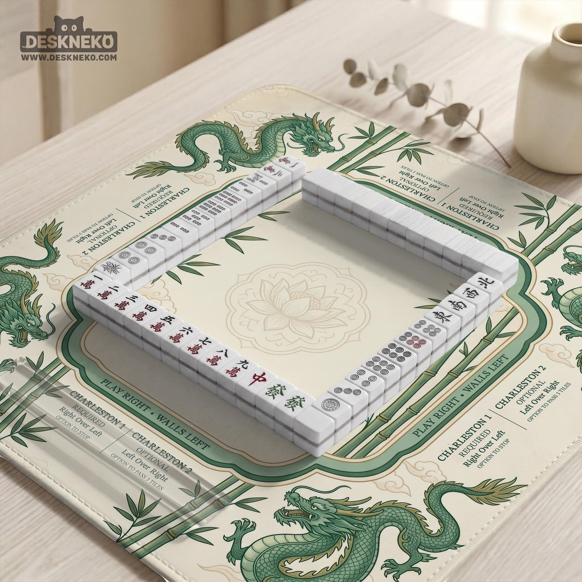 Sage green mahjong mat with a bamboo pattern, dragon design, printed rules around the edge, and a scalloped edge option.