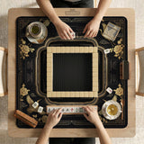 Black and gold square mahjong mat with an art deco crane and floral border, rule reminders around the edges, and a blank center area.