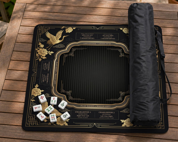 Black and gold square mahjong mat with an art deco crane and floral border, rule reminders around the edges, and a blank center area.