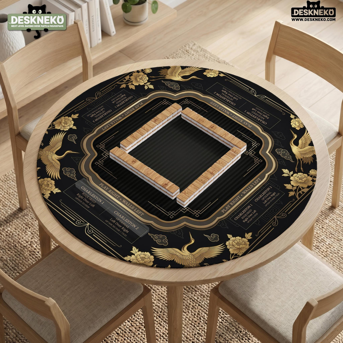 Black and gold square mahjong mat with an art deco crane and floral border, rule reminders around the edges, and a blank center area.