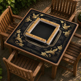 Black and gold square mahjong mat with an art deco crane and floral border, rule reminders around the edges, and a blank center area.